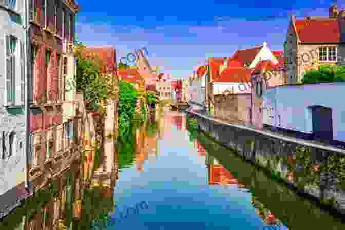 Picturesque Canals Of Bruges, Belgium, Lined With Charming Buildings And Cobblestone Streets Travellers Tales: A Collection Of Travel Articles About France (and Belgium) (Eclectic Travel 1)